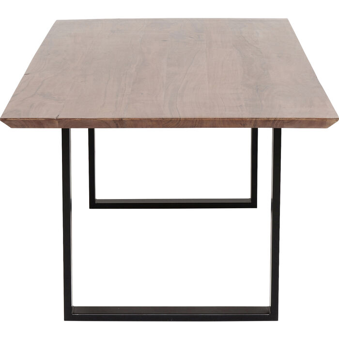 Magnifique table tendance rectangulaire en bois massif foncé à empiètement noir Symphony de la marque Kare Design